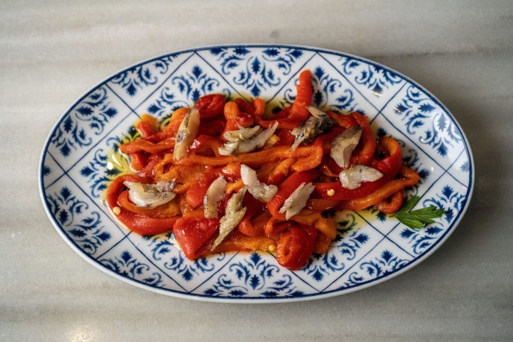 Tomato dish with fish and olive oil at Alenar Bodega Mediterránea, Valencia