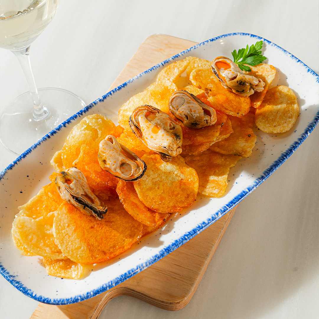 Papas extra gruesas con Mejillones gigantes en Escabeche braseado